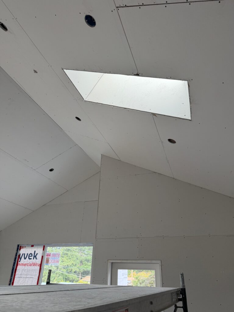 Drywall ceiling installed with pot light cut-outs